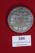 German Third Reich commemorative tinnie, circular form for 15 Jahre Ortsgruppe Landshut 1920–1935,