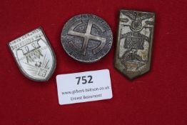 Three German day badges, including: silvered shield badge Schlageter Tag NSDAP Nied. Geb. 1934,