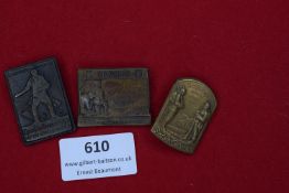A group of three German commemorative badges, including examples for the XIII Army Corps and other