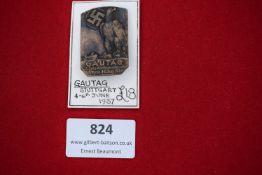 A 1937 Gautag participant badge, marked GAUTAG Stuttgart 4–6 Juni 1937, with eagle and swastika
