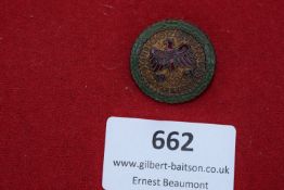 A round enameled badge for the Landesstands Schützenverband Tirol-Vorarlberg, dated 1943,