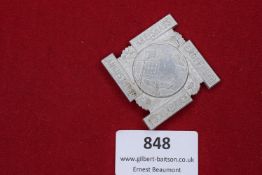 German Day of Labour Badge, 1933, circular tin badge depicting the Brandenburg Gate above a swastika