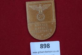 1938 Munich Badge, a pressed card badge with embossed eagle and swastika, inscribed Männer Machen