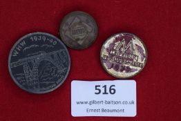 A group of three tinnies including WHW 1939–40 Winterhilfswerk badge, Leipzig Spring Fair 1937