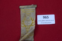 A scarce woven silk event ribbon badge, inscribed 34. Deutsche Jägertage Saarbrücken 1935, with