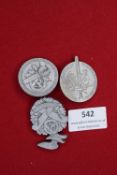 Three German Third Reich SA Event Day Badges, comprising: a circular badge for SA Gruppe Kurpfalz