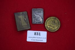 A group of three badges, including: 1927 German Fisheries Congress at Kiel, 1933 Sports Festival