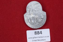 1937 Hamburg-Bergedorf event badge, depicting sailing ship and townscape, with maker Carl Wild