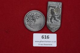 Two German Badges: one WHW (Winterhilfswerk) 1938/39 circular badge, 