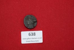 A small round pressed metal badge commemorating the period 1758–1936, featuring the profile of a