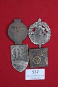 A group of four Third Reich SA badges: SA Treffen Dortmund 1932; Brigade-Aufmarsch Uelzen 1934;