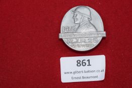 1936 RJR 25 Regimental Reunion Badge, silvered tinnie showing soldier in helmet with “25” and
