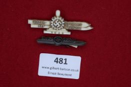 Two horizontal badges: a large white plastic tinnie for the Winter Sporttag der Betriebe 1938,