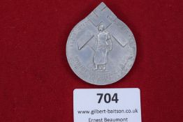 An aluminium day badge commemorating the Kreisparteitag in Aachen, 1935, also marking 10 years of