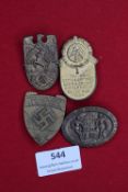 Four German Third Reich SA Day Badges, mixed designs, including oval and shield-shaped examples