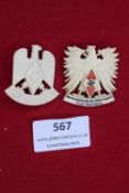 Two plastic Hitler Youth event badges including Kampfspiel der Nordmark 1937 and Tirol-Vorarlberg
