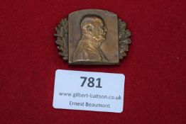German bronze profile plaque badge of Friedrich, with oak leaf wreath embellishment.