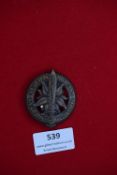 SA badge, circular bronze example with central edelweiss and sword, inscribed SA Gruppe Hochland