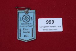 NS Gemeinschaft KdF Kieler Woche 1934 Badge, blue paper event badge, pointed design, inscribed NS