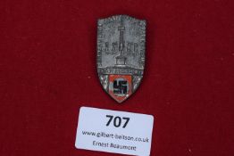 A shield-shaped tinnie badge for the NSDAP Sonnenwende (Summer Solstice) celebration held in