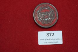 Glückstadt Schiffstammabteilung Badge, a circular tinnie in grey metal with red enamel highlights,