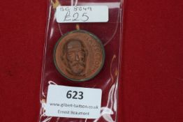 German Third Reich Badge – terracotta portrait of Klaus Groth mounted in circular pinback frame.