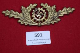 German WWII RADwJ (Reichsarbeitsdienst der weiblichen Jugend) cap badge in gilt metal with oakleaf
