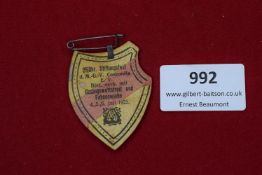 Concordia Song Festival Badge, 1925, a printed card badge commemorating the 25th anniversary of