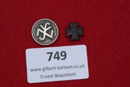 Two German pin badges, including a small enamelled Iron Cross with 1939 to obverse, and a round