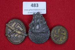 Three event badges: a bronze oval tinnie for the Erste NS-Flugwoche, Fürth i.B., Pfingsten 1933; a