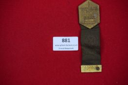 Nazi Era Rally Badge with Ribbon – Hexagonal gilt metal badge for a rally in Einhof (1936),