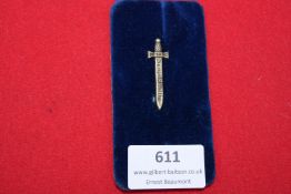 German Third Reich “Treue” pin, in the form of a miniature sword, inscribed along the blade. Mounted
