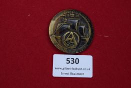 A 1938 SA Gruppenwettkämpfe badge for Gruppe Hansa, circular bronze example depicting a sailing ship