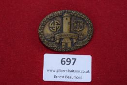 An oval bronze badge for the 3rd District Gymnastics Festival, Leonfelden, 28–29 May 1927. Central