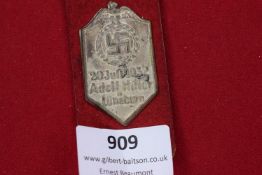 20 July 1932 Adolf Hitler Lüneburg rally badge, shield-shaped design with swastika within wreath,