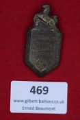 A small bronze-finish tinnie for the NSDAP rally at Hannover, 26–25 February 1934, inscribed with