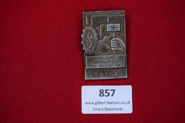 1935 NSBO Aufmarsch Badge, Gotha, rectangular bronze tinnie showing cogwheel and arm with hammer,