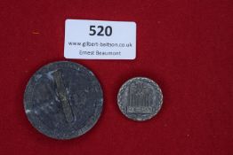 Two German badges, comprising: a large circular tinnie inscribed for the 15. Deutscher Turn- und