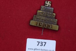 A German Third Reich Day Badge, bronze, stepped form inscribed Arbeit und Friede, Gauparteitag