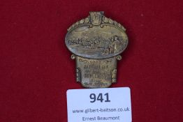 A large cast bronze badge depicting a town view, inscribed 1000 Jahr Feier der Stadt Schlitzau, 16–