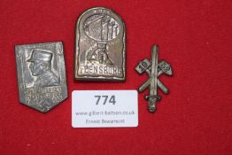 A group of three Third Reich and pre-Third Reich badges, comprising: a 1933 Ehrenbürger Stadt