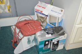 Telephone, Speakers, and a Cat Flap