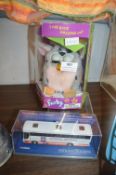 Furby and a Corgi National Holidays Diecast Bus