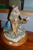 Large Capodimonte Style Figure of a Man with Doves