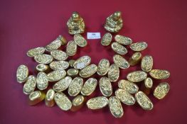 Quantity of Zinc Ingots in the form of Buddhas etc.