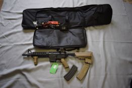 Tokyo Marui Colt M4A1 Carbine BB Rifle (S/N W406734) with two magazines, black carry case, battery p