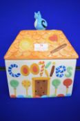 Bluer Cat on House Cookie Jar