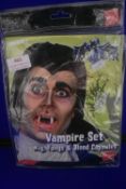 Vampire Set Including Wing, Fangs, and Blood Capsules