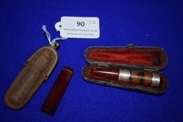 2x Cased Cigarette Holders Including One with Hallmarked Silver Mounts -Birmingham 1911