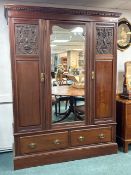 Edwardian Wooden Armoire with Central Mirror, featuring carved panels with bird and floral motifs, 3